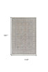 7' X 10' Silver Taupe and Blue Oriental Power Loom Worn Faded Area Rug With Fringe